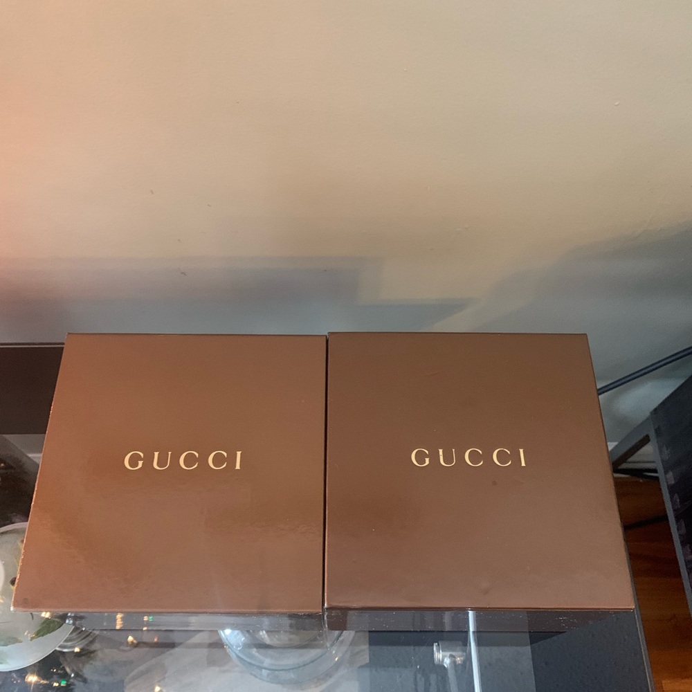 Empty Gucci boxes and Versace